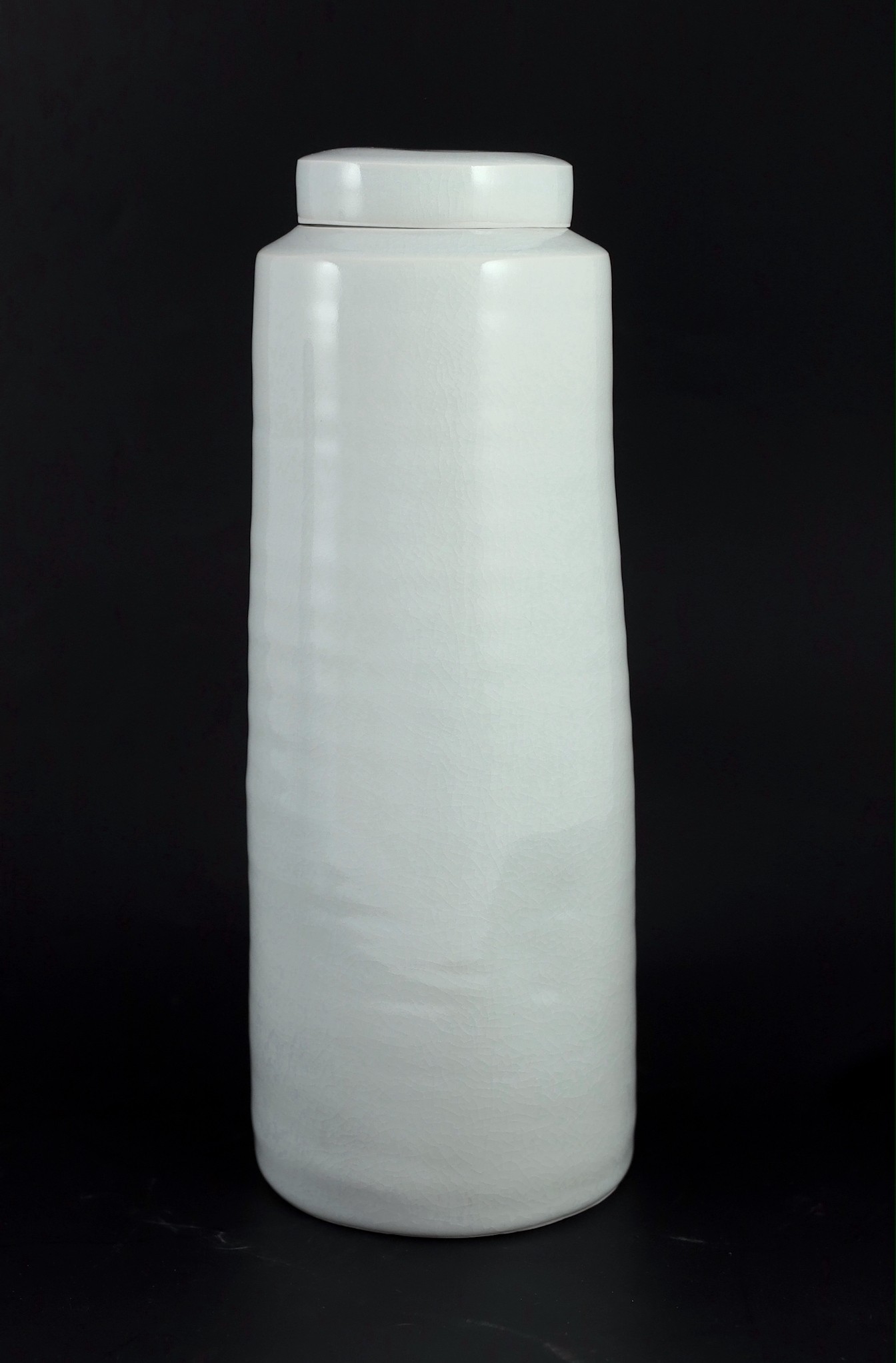 Edmund de Waal (b.1964) a tall porcelain lidded jar, c.1993, 33.4cm high